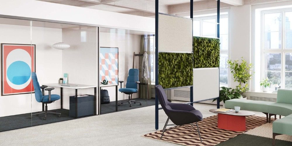 Modern office with glass-walled private workspaces