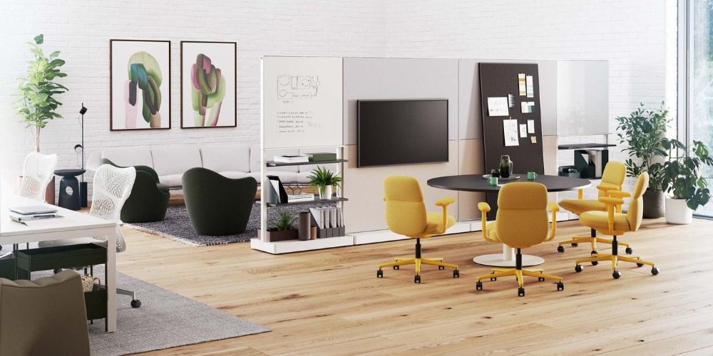 office space featuring yellow Herman Miller desk chairs